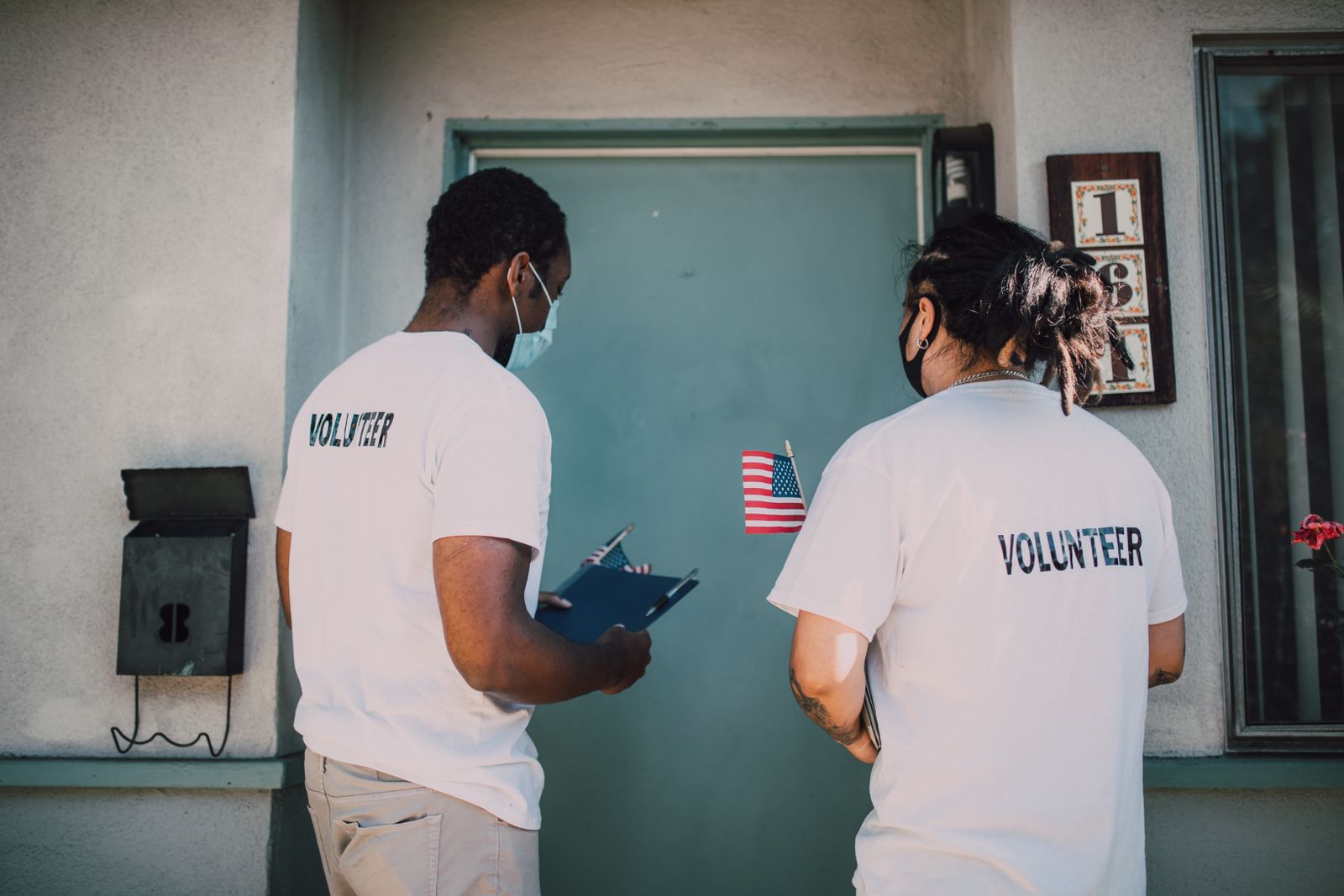 Two people talking during a community outreach visit