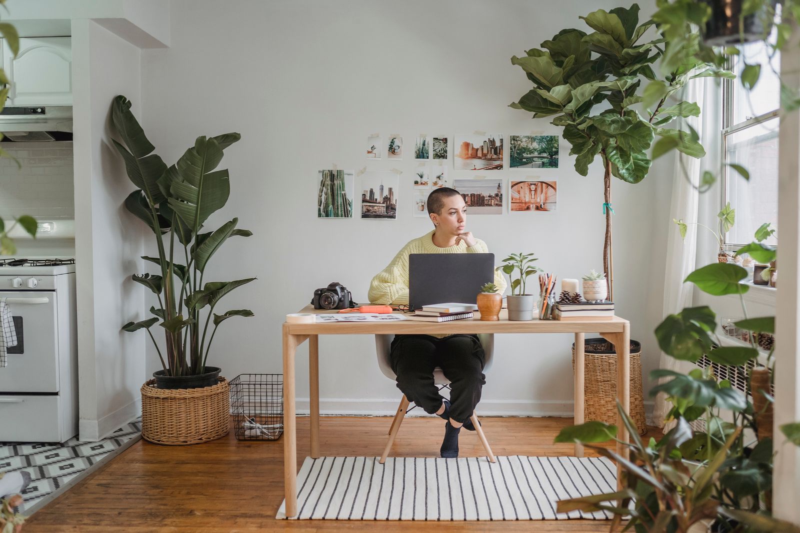 A person working at a table in a bright office space