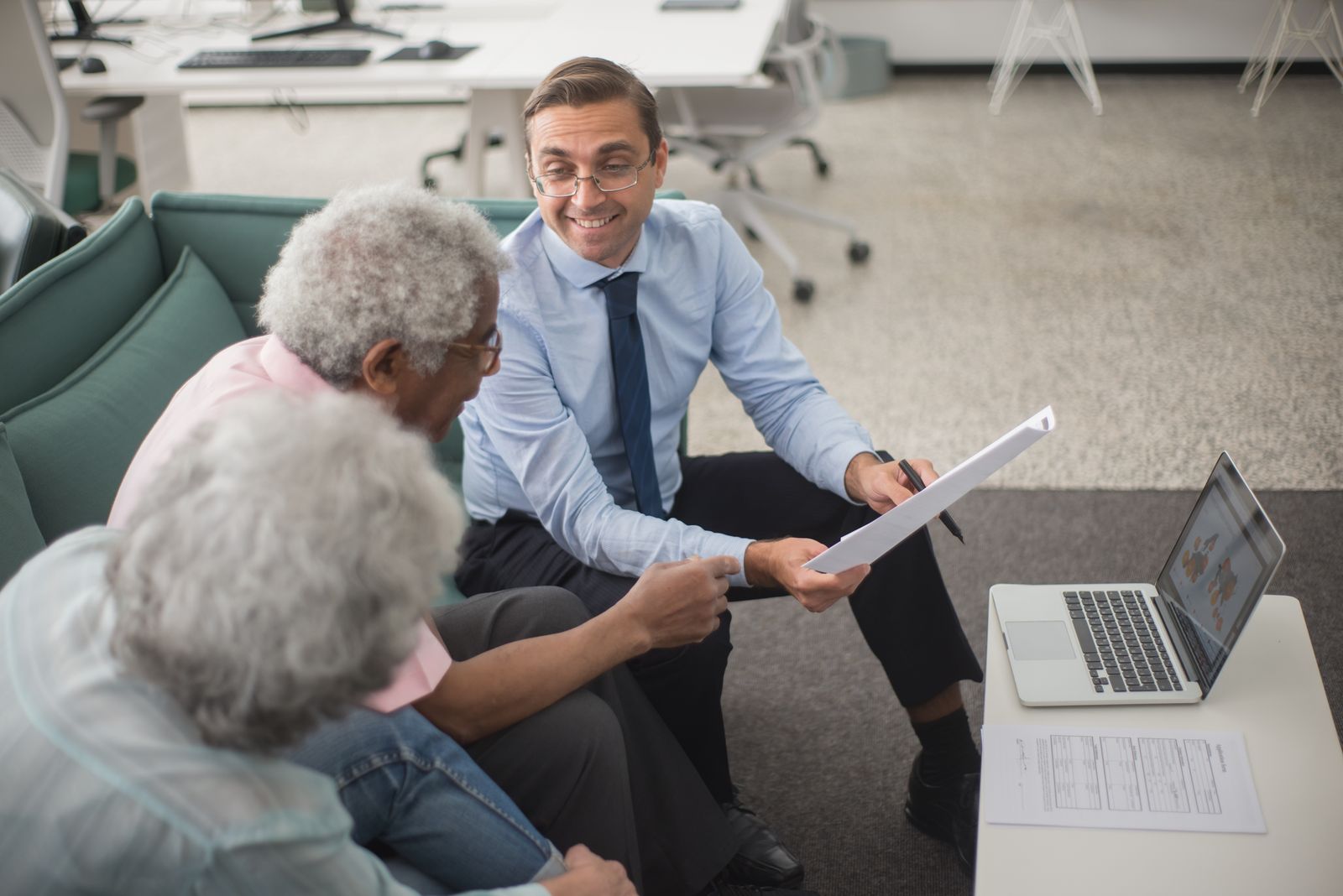 An advisor and a client going through plan documents together